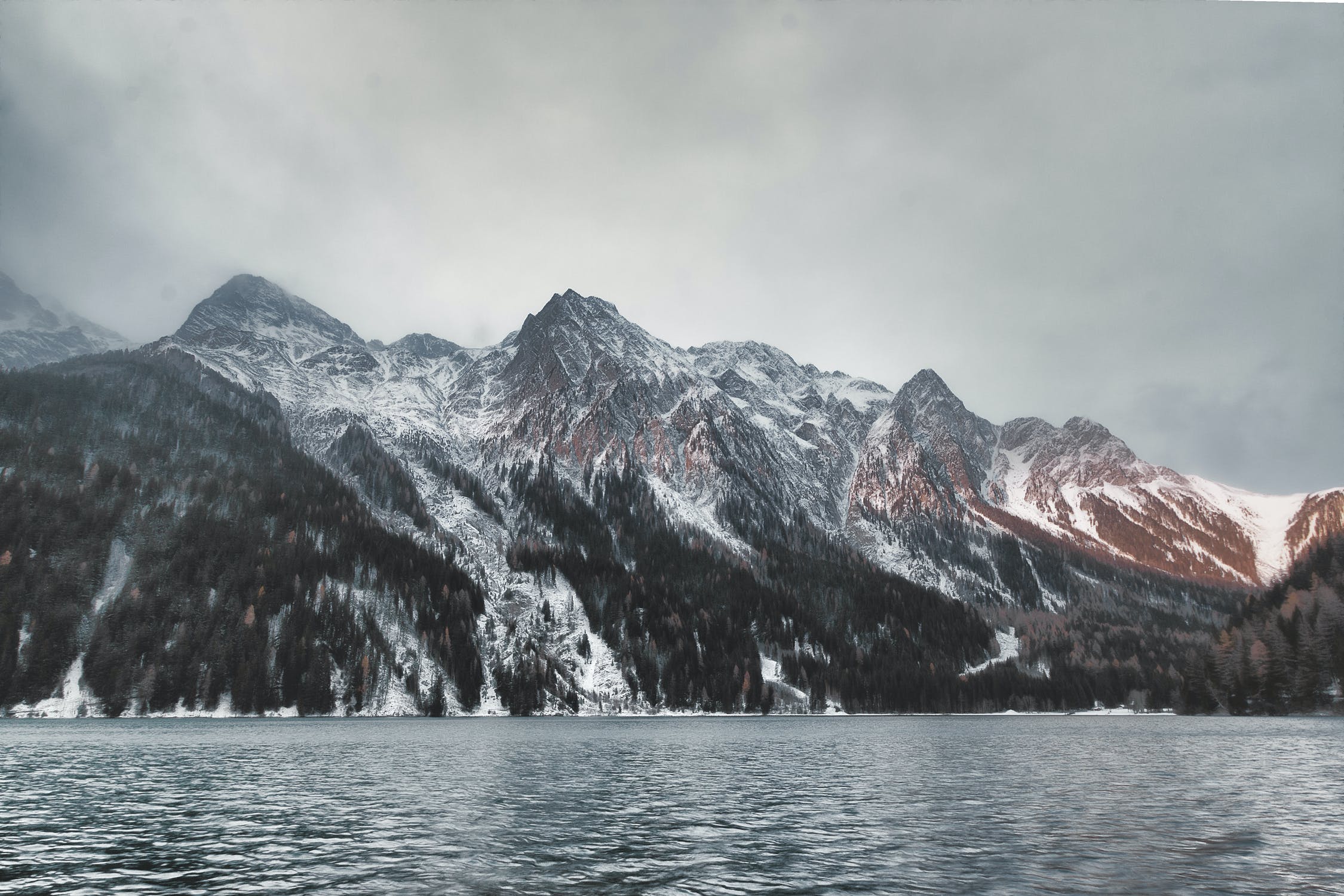 Mountain range reflected across a lake